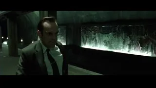 two men fighting in a dimly lit alleyway — The Matrix