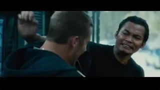 two men fighting in dark room — Furious Seven