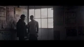 Two men in abandoned room — Creed