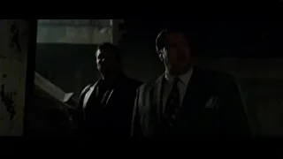 Two men in dimly lit room, one with gun — Fight Club