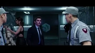two men in futuristic room talking — Now You See Me 2