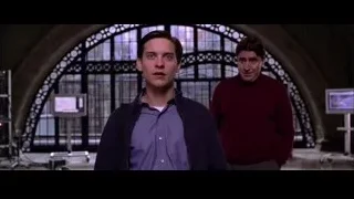 two men in large room with arched windows — Spider Man 2