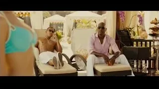 two men sitting on lounge chairs outdoors — Furious Seven