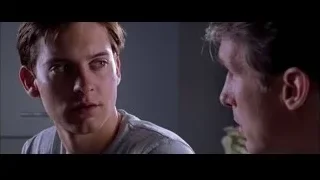 two young men in tense conversation — Spider Man 2