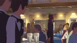 waiter talking to customers in restaurant — Your Name