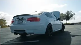 white sports car driving on road — Sports Cars