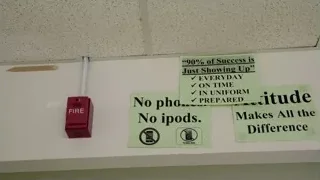 Whiteboard with sticky notes and fire alarm — Screened Out