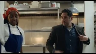Woman and man in kitchen cooking — The Bear