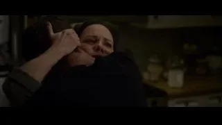 Woman crying and hugging in a kitchen — The Amazing Spider Man