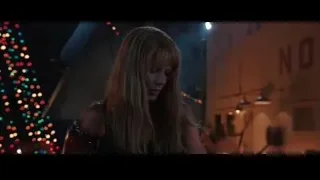 woman deep in thought in dimly lit room — Iron Man 3
