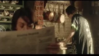 woman reading newspaper in kitchen — Peaky Blinders