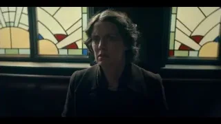 woman sitting by stained glass window — Peaky Blinders