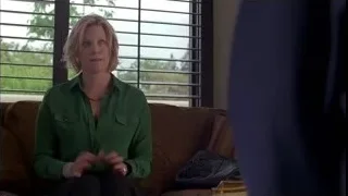 woman sitting on couch in living room — Breaking Bad