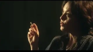 woman smoking cigarette in dark — Peaky Blinders