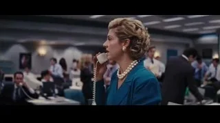 woman talking on phone in office — The Wolf Of Wall Street