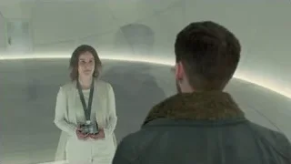 woman with camera in futuristic room — Blade Runner 2049