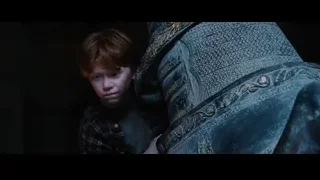 Young boy in plaid shirt with metal armor — Harry Potter and the Philosophers Stone