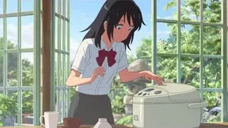 young girl in kitchen with rice cooker — Your Name