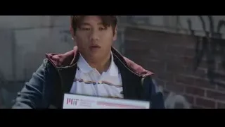 young man holding paper in front of wall — Spiderman: No Way Home