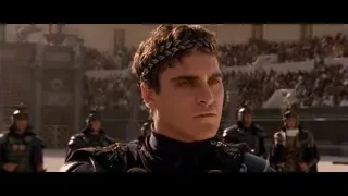 Young man in armor standing before a crowd — Gladiator
