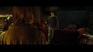 young man standing in dimly lit room with fireplace — Harry Potter and the Goblet of Fire