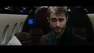 Young man with beard sitting in airplane — Now You See Me 2
