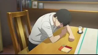 young man with head in hands at table — I Want To Eat Your Pancreas