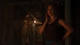 young woman in dimly lit dilapidated room — The Avengers