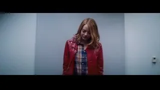 Young woman in red leather jacket looking serious — La La Land