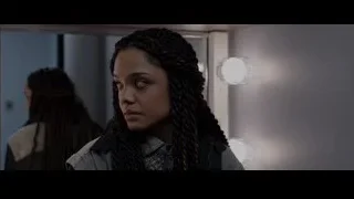 Young woman with braided hair in hallway — Creed