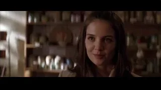 young woman's face in room with shelves — Batman